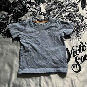 Carter's solid blue baby boy shirt.